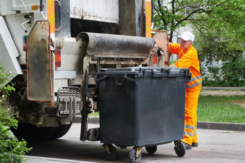 Operatives wearing PPE preparing equipment